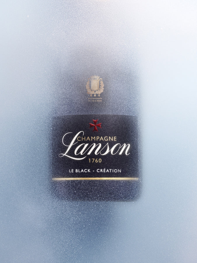 Closeup on the Lanson Le Black Création champagne bottle